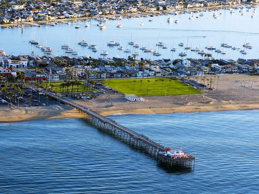 Aerial view of Balboa Pier, Newport Harbour and the Balboa Peninsula in Newport Beach, Orange County.